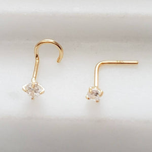 14K Gold and Diamond CZ nose stud shown in screw or L-Bend style, 22 gauge, on a white background by Studio Blue on Etsy