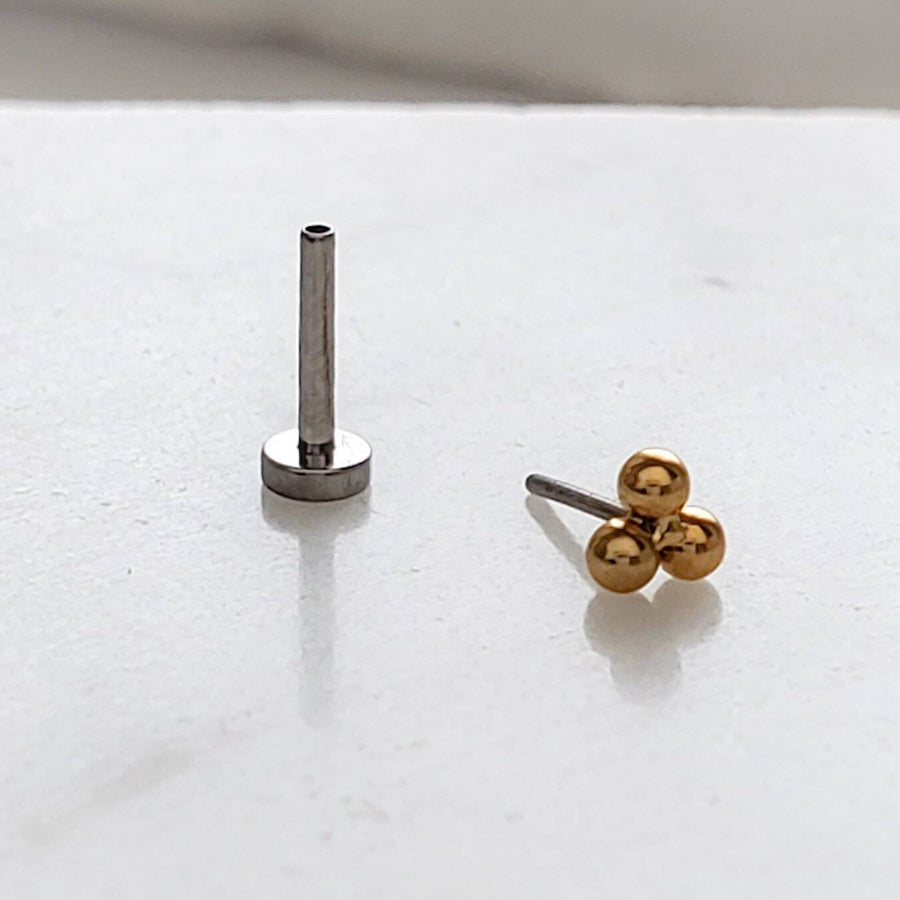 Tiny 3 bead titanium push in flat back stud shown 14K Gold Plate on white background by Studio Blue on Etsy