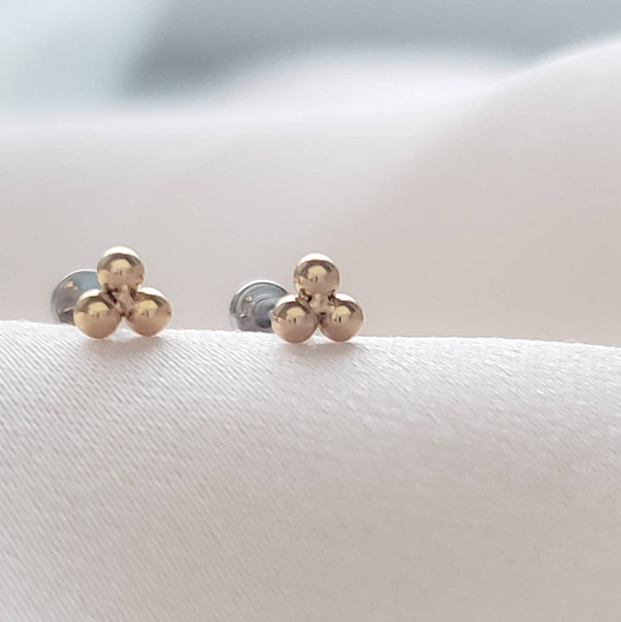 pair of Tiny 3 bead titanium push in flat back stud shown 14K Gold Plate on white background by Studio Blue on Etsy