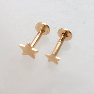 Solid 14K Gold Star studs, overhead shot of the 3mm and 4mm side by side on white background by Studio Blue on Etsy