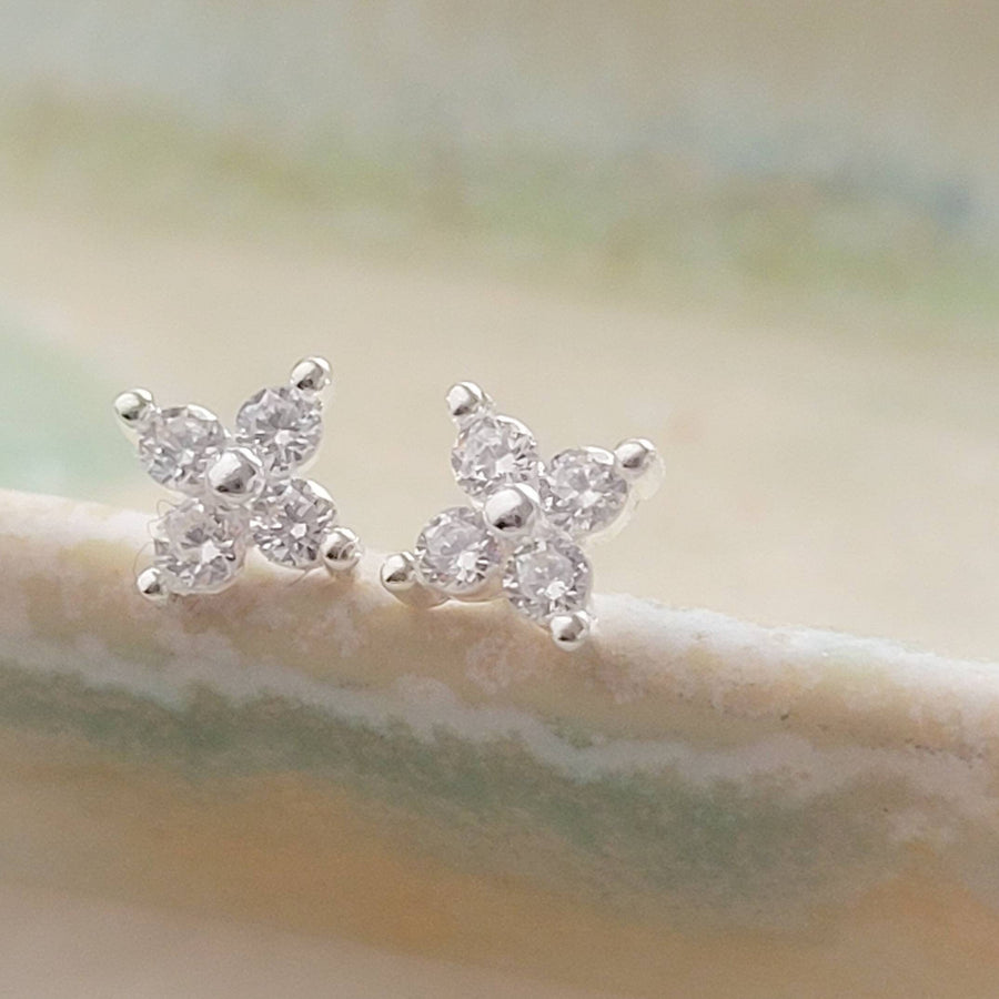 Dainty stud earrings with 4 tiny round diamond CZs bead set in Sterling Silver