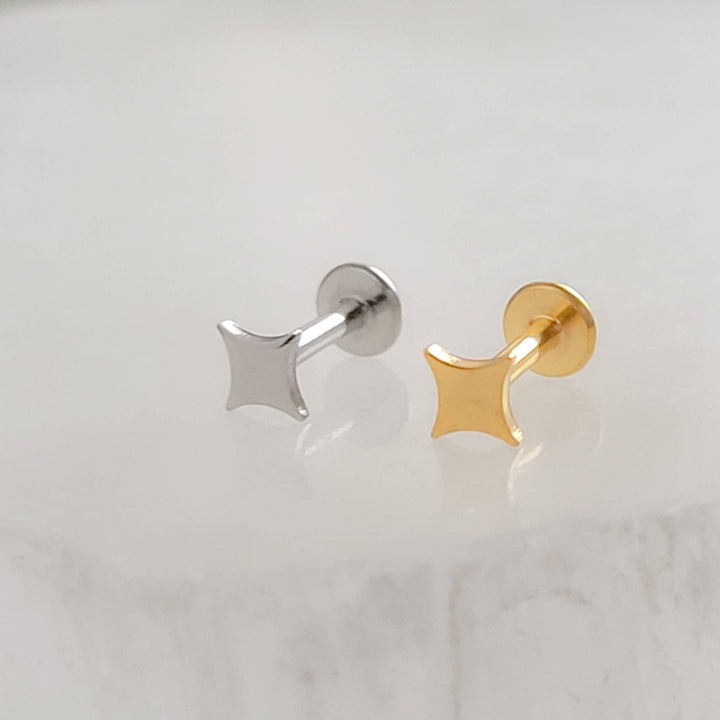 Four-point starburst design in a screw-in style flat back design. 16 Gauge Surgical Steel or 14K Gold plated earrings studs by Studio Blue on Etsy