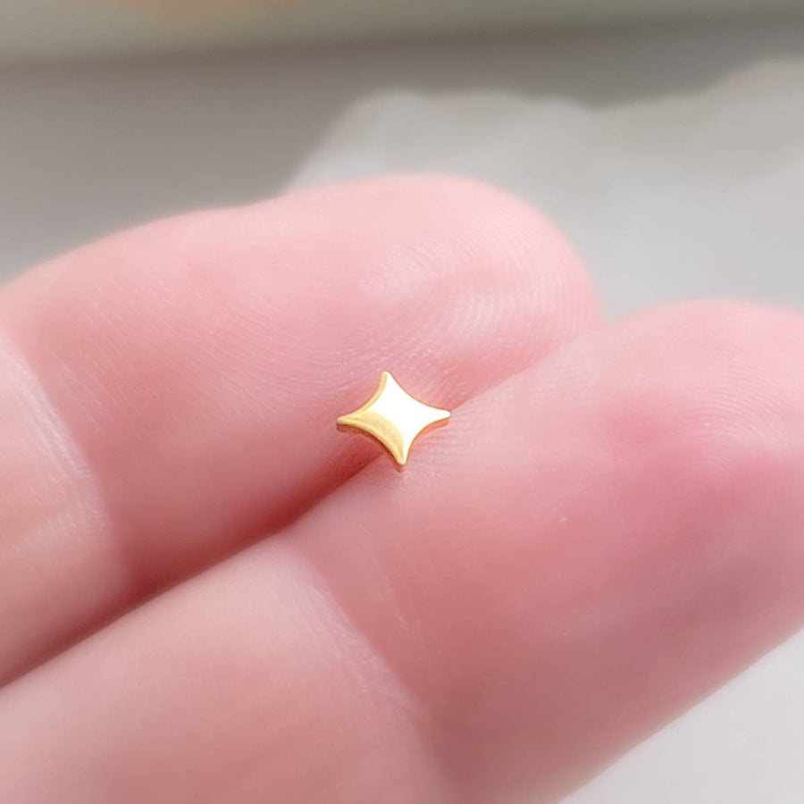 Four-point starburst design in a screw-in style flat back design. 16 Gauge Surgical Steel or 14K Gold plated earrings studs by Studio Blue on Etsy