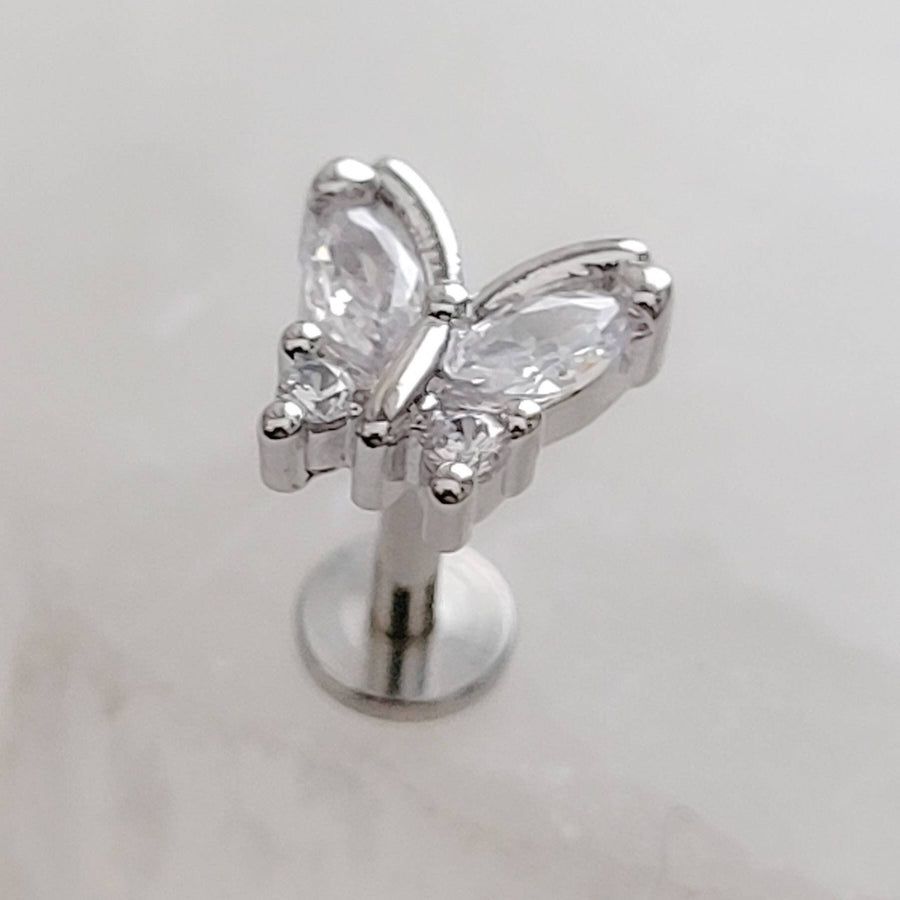 Diamond CZ Butterfly stud in 316L Surgical steel shown on white background. Screw-in, flat-back nap studs by Studio Blue on Etsy