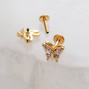 Diamond CZ Butterfly studs in 14k Gold plated 316L Surgical steel shown on white background. Screw-in, flat-back nap studs by Studio Blue on Etsy