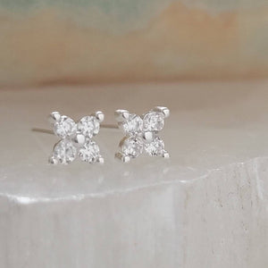 Dainty stud earrings with 4 tiny round diamond CZs bead set in Sterling Silver