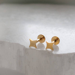 Four-point starburst design in a screw-in style flat back design. 16 Gauge Surgical Steel or 14K Gold plated earrings studs by Studio Blue on Etsy