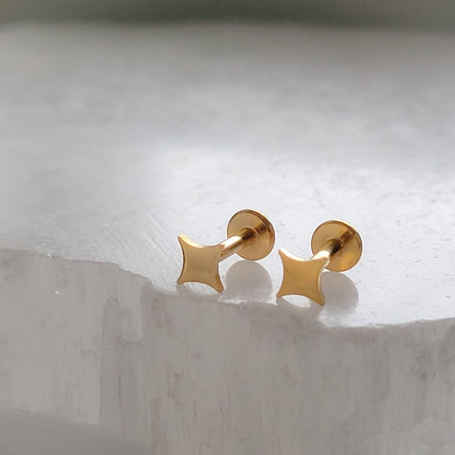 Four-point starburst design in a screw-in style flat back design. 16 Gauge Surgical Steel or 14K Gold plated earrings studs by Studio Blue on Etsy