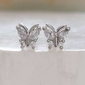 Diamond CZ Butterfly studs in 316L Surgical steel shown on white background. Screw-in, flat-back nap studs by Studio Blue on Etsy