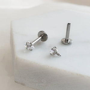 Screw in flat back studs in 316L surgical steel prong set with tiny marquise-shaped diamond cz by Studio Blue on Etsy