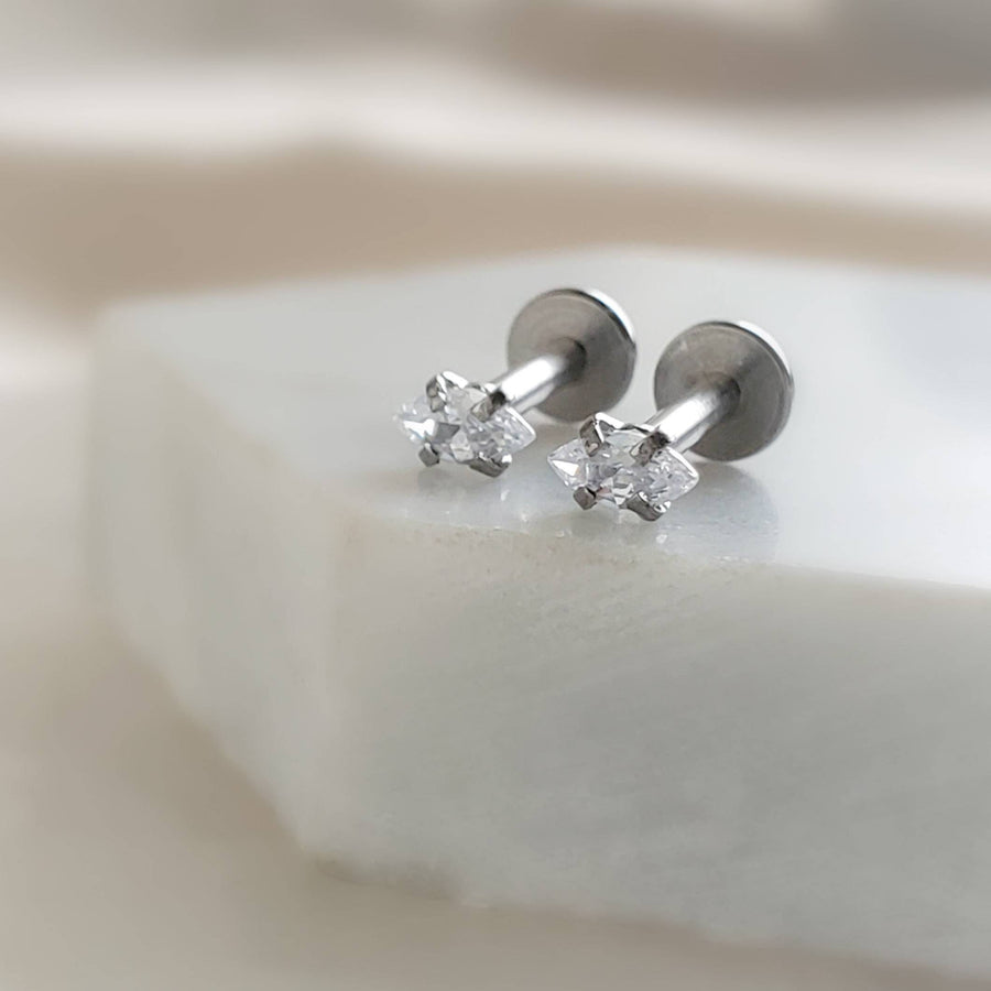 Screw in flat back studs in 316L surgical steel prong set with tiny marquise-shaped diamond cz by Studio Blue on Etsy