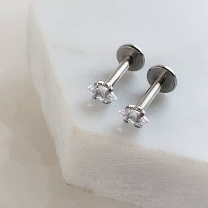 Screw in flat back studs in 316L surgical steel prong set with tiny marquise-shaped diamond cz by Studio Blue on Etsy