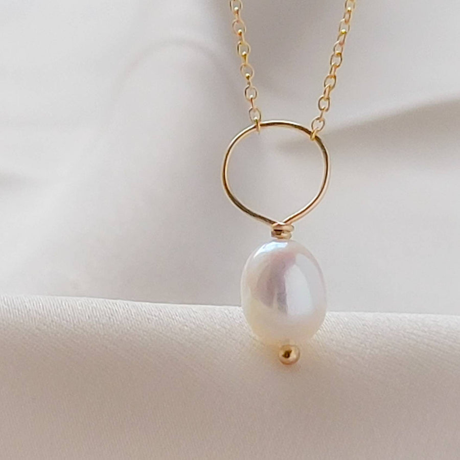 Oval freshwater pearl on oversized loop and delicate chain. Bridal Jewelry by Studio Blue