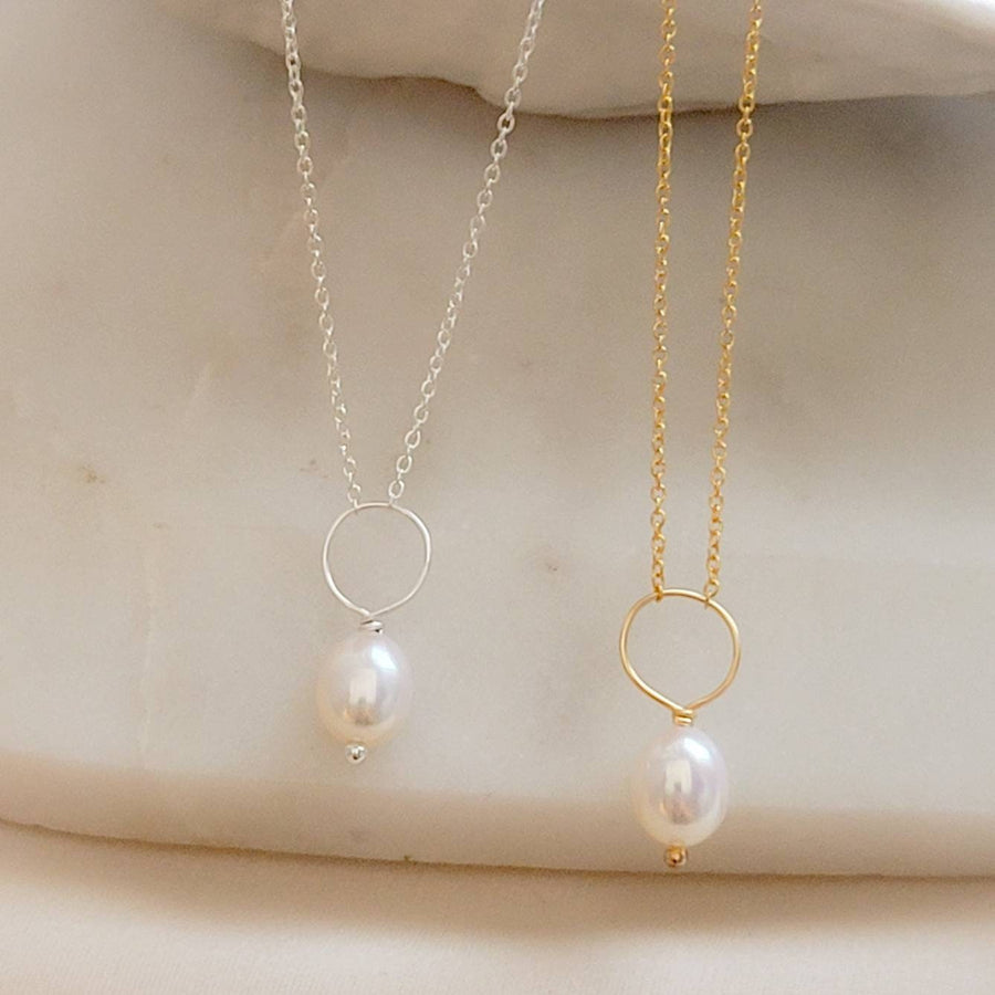 Oval freshwater pearl on oversized loop and delicate chain. Bridal Jewelry by Studio Blue