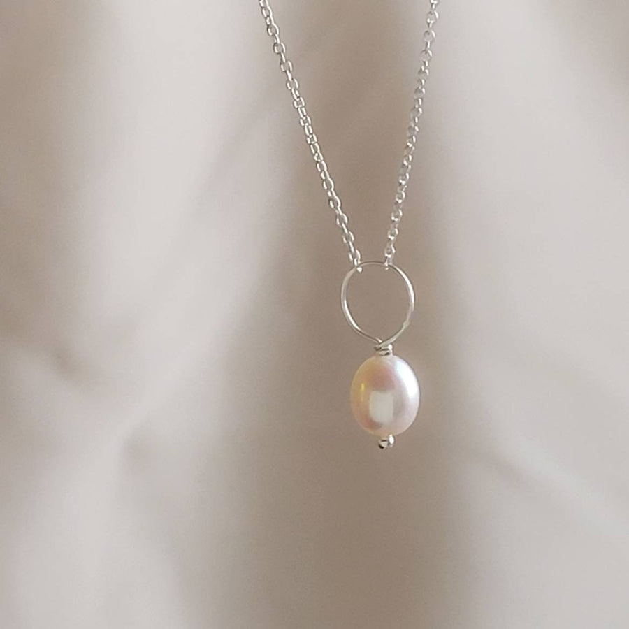 Oval freshwater pearl on oversized loop and delicate chain. Bridal Jewelry by Studio Blue