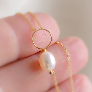 Oval freshwater pearl on oversized loop and delicate chain. Bridal Jewelry by Studio Blue