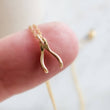 Load image into Gallery viewer, Tiny Wishbone Necklace • Dainty Wishbone Charm • Delicate Gold Chain • Layering Necklace • Good Luck Charm • Girlfriend Gift • Bestie Gift

