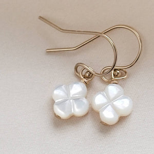 Hand carved mother of pearl 4 leaf clover drop earrings in 14k gold fill. - By Studio Blue