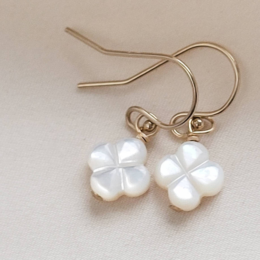 Hand carved mother of pearl 4 leaf clover drop earrings in 14k gold fill. - By Studio Blue