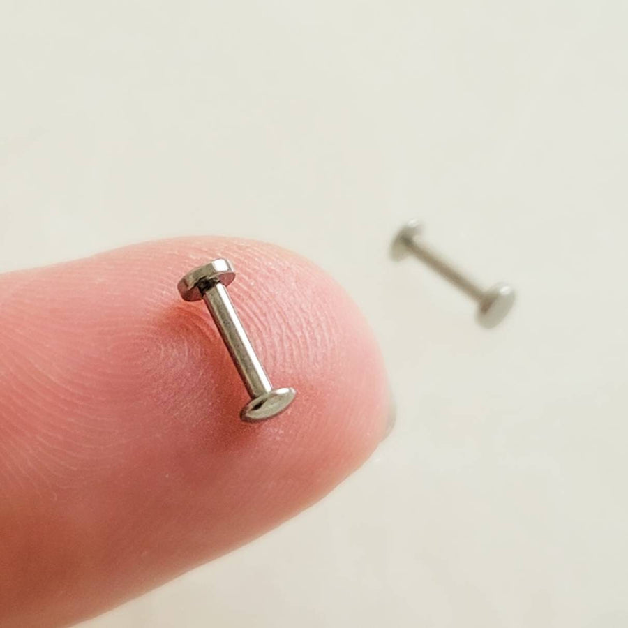 Flat back Dot Studs, Screw in flat back earrings in 316L Surgical Steel. Available in 2 sizes, 3mm & 4mm on finger, by Studio Blue on Etsy