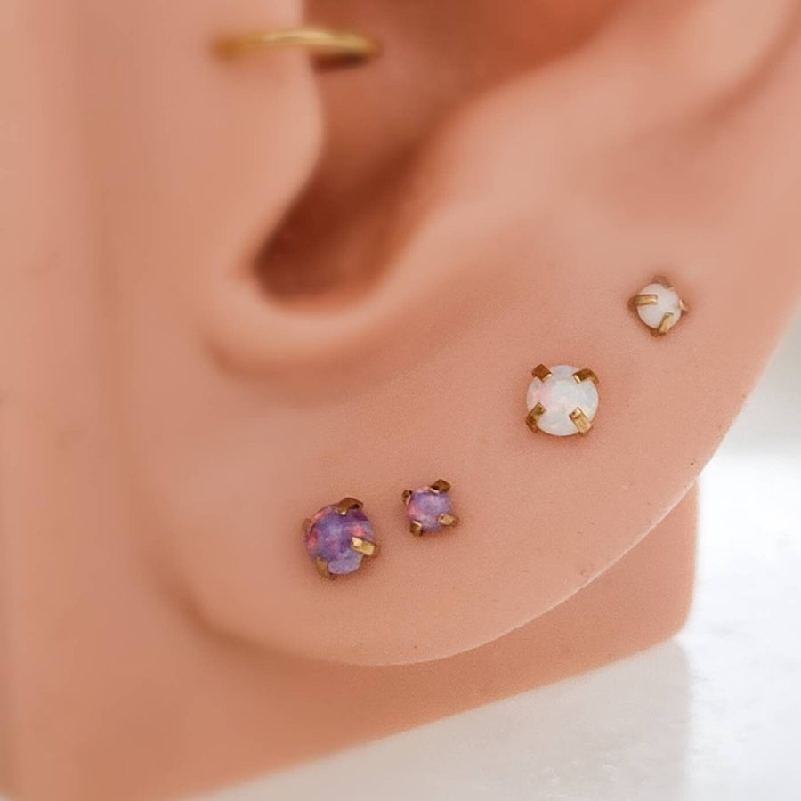 Ear featuring Opal flat back studs. 316L Surgical Steel or 14K gold plated, push in style in purple, blue or white by Studio Blue on Etsy