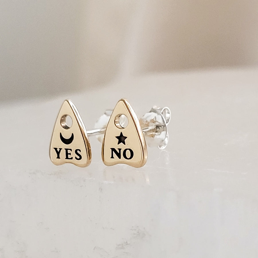 Bronze Ouija Board-inspired stud earrings on a white background. Yes & No, Moon & Star. By Studio Blue on Etsy