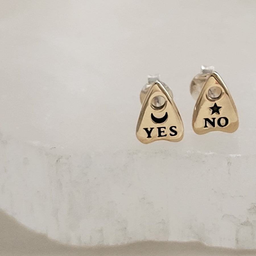 Bronze Ouija Board-inspired stud earrings on white background. Yes & No, Moon & Star. By Studio Blue on Etsy