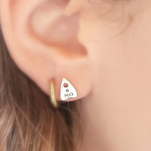 Sterling Silver Ouija Board-inspired stud earrings on model. Yes & Star. By Studio Blue on Etsy