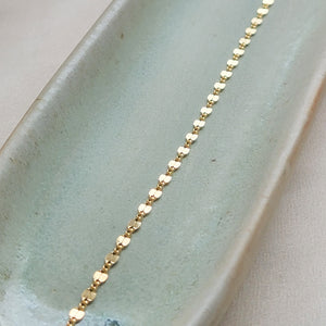 Dainty shimmer chain in 14k gold fill on sage green, oblong ceramic dish by Studio Blue on Etsy