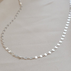 Dainty shimmer chain in sterling silver on light background by Studio Blue on Etsy