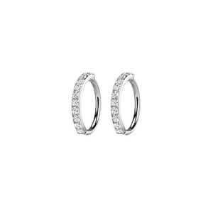 pair of platinum and pave hoops