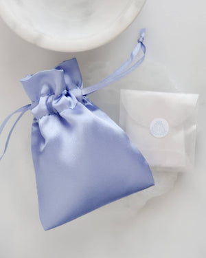 Blue satin pouch with glassine envelope 